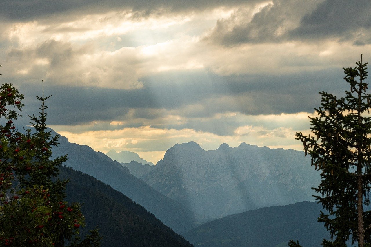 mountains light rays light bright 7881314